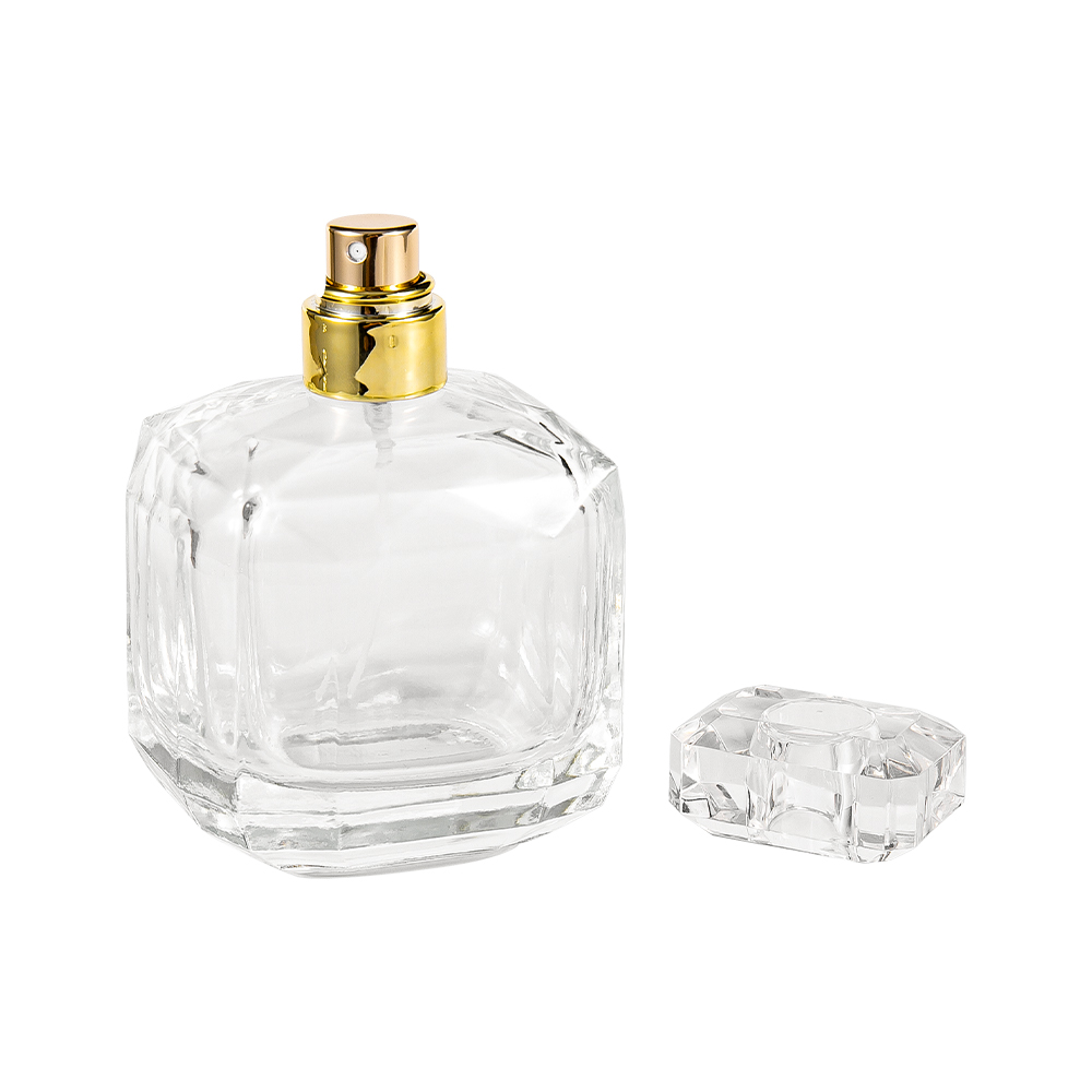 GC3898-WJ2005 Botella de perfume de vidrio transparente de 100 ml con tapa acrílica Surlyn y cuello dorado brillante