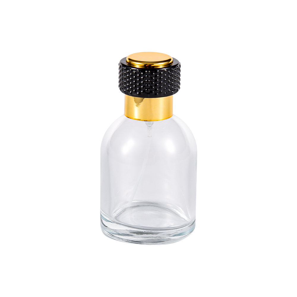 GC3986-WJ816 Botella de perfume de vidrio transparente de 50 ml con tapa de plástico dorado para UV y parte negra