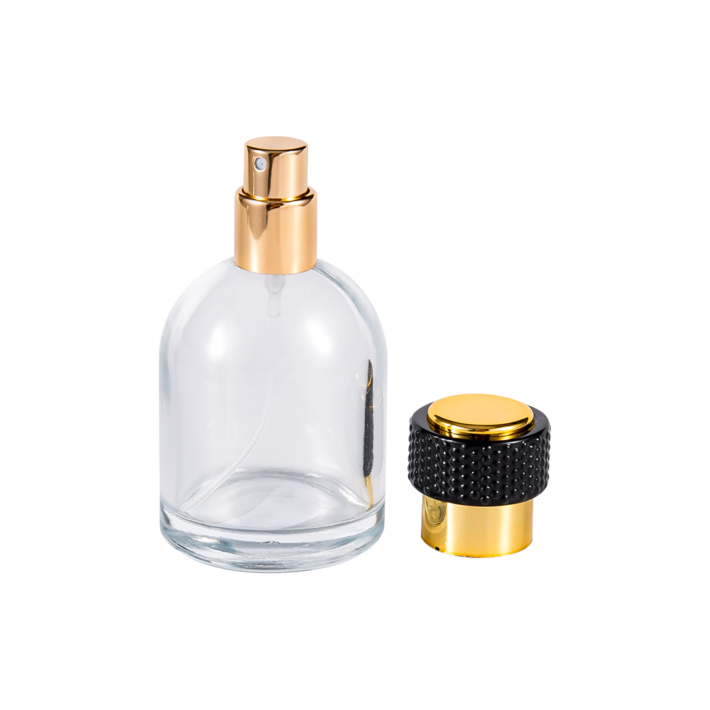 GC3986-WJ816 Botella de perfume de vidrio transparente de 50 ml con tapa de plástico dorado para UV y parte negra