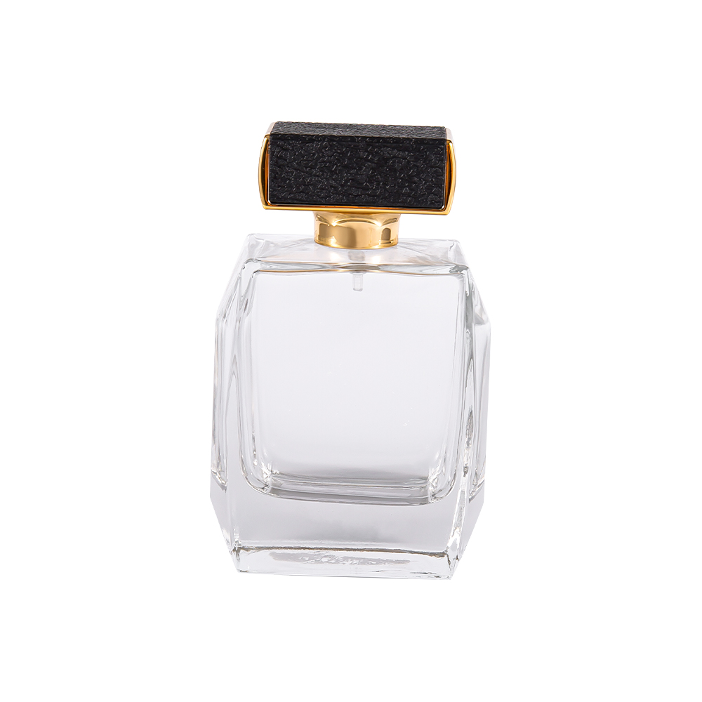 KY1092-WJ2092 Botella de perfume de vidrio transparente de 100 ml con cubierta de plástico de cuero y piezas bañadas en oro UV