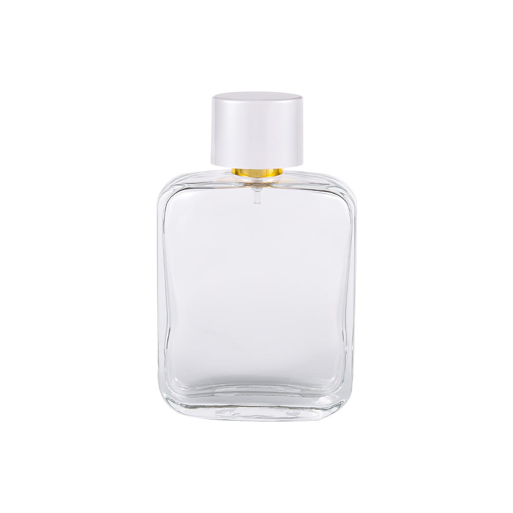 Botella de perfume de vidrio transparente GC4840-WJ2162 de 100 ml con tapa de plástico Pp blanco brillante y revestimiento chapado en oro UV