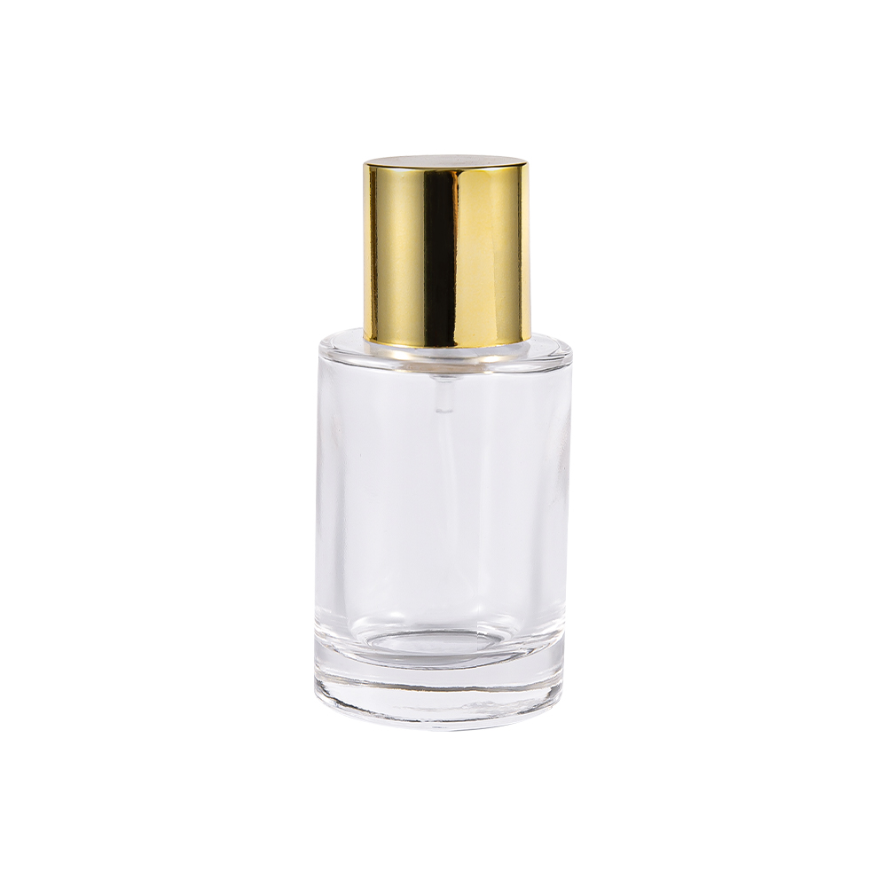 GC4004-WJ2388 Botella de vidrio de perfume cilíndrica transparente con tapa de PP dorada brillante UV Plástico