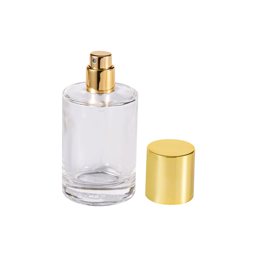 GC4004-WJ2388 Botella de vidrio de perfume cilíndrica transparente con tapa de PP dorada brillante UV Plástico