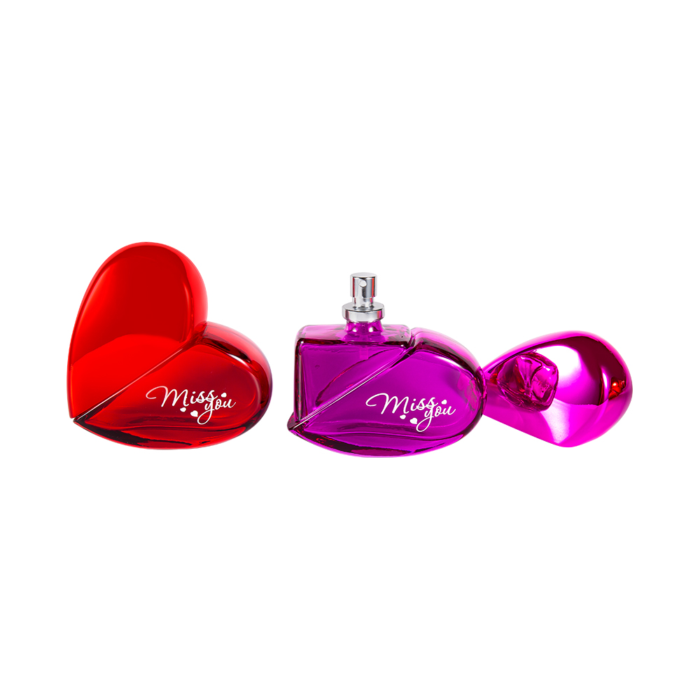 GC102-WJ797 Botella de perfume de vidrio en forma de corazón de 100 ml con tapa de plástico UV PP