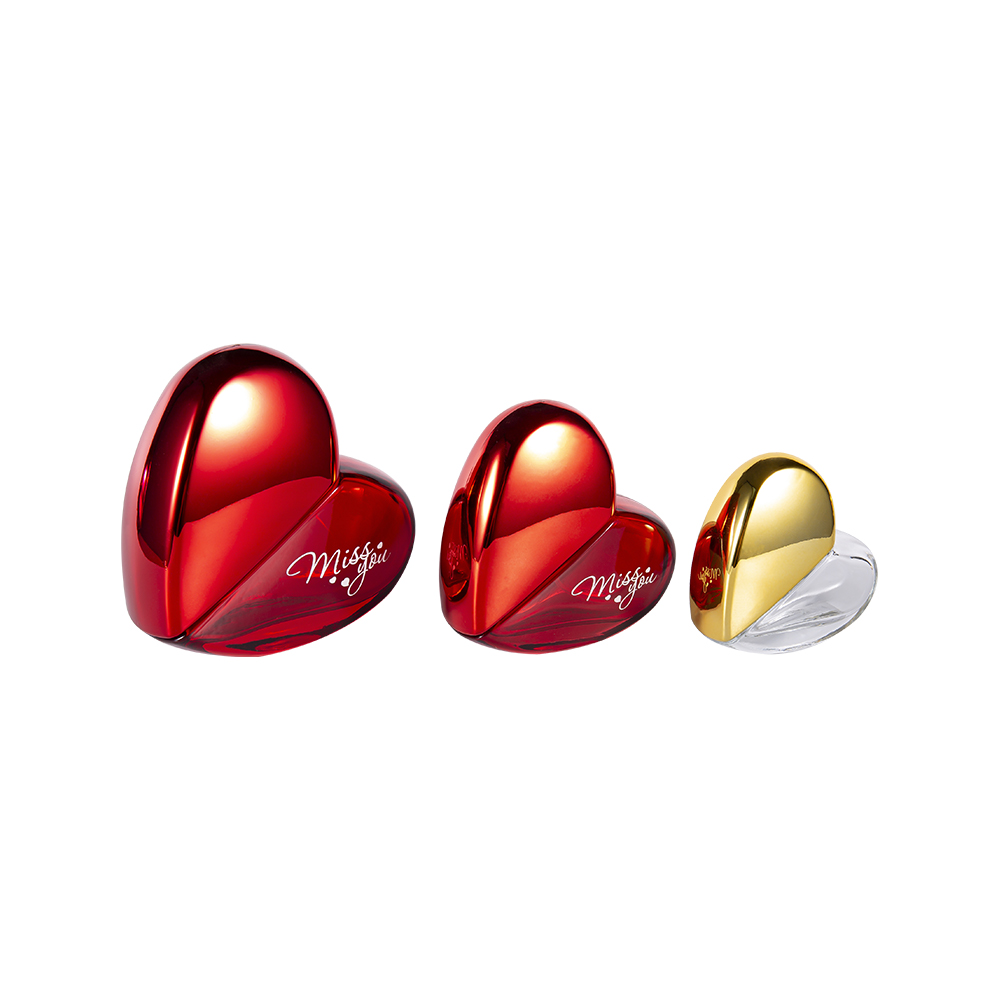 GC102-WJ797 Botella de perfume de vidrio en forma de corazón de 100 ml con tapa de plástico UV PP